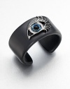 From the Envy Collection. The eyes have it in this striking cuff of jet black resin, dramatically adorned with a sweeping silver-outlined eye that gazes and glitters intently, set with cubic zirconia and black onyx.Black onyxBlack, white and blue cubic zirconiaSterling silverResinDiameter, about 2.25Imported