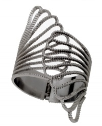 Utterly unique and fiercely in fashion, by GUESS. Hinged claw cuff bracelet crafted from hematite-plated mixed metal. Approximate diameter: 2-1/4 inches. Utterly unique and fiercely in fashion, by GUESS. Hinged claw cuff bracelet crafted from hematite-plated mixed metal. Approximate diameter: 2-1/4 inches.