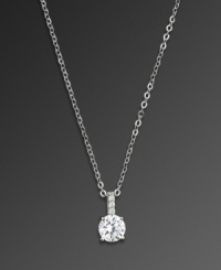 Make a statement in solitaire sparkle. CRISLU pendant features a single, round-cut cubic zirconia (1 ct. t.w.) set in platinum over sterling silver, with glittering cubic zirconia accents at the bail. Approximate length: 16 inches. Approximate drop: 7/8 inch. Make a statement in solitaire sparkle. CRISLU pendant features a single, round-cut cubic zirconia (1 ct. t.w.) set in platinum over sterling silver, with glittering cubic zirconia accents at the bail. Approximate length: 16 inches. Approximate drop: 7/8 inch.