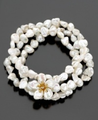 A bracelet that captures the beauty of the islands with cultured freshwater Keishi pearls (7-8 mm) set in 14k gold. Stretches to fit wrist. Approximate length: 7-1/4 inches. A bracelet that captures the beauty of the islands with cultured freshwater Keishi pearls (7-8 mm) set in 14k gold. Stretches to fit wrist. Approximate length: 7-1/4 inches.