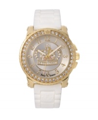 Be the queen of your castle with Juicy Couture's over-the-top Pedigree watch. White jelly strap and round gold-plated stainless steel case. Bezel crystallized with Swarovski elements. Champagne dial features applied goldtone numerals, luminous hands with a touch of pink and iconic crown logo glittering with crystal accents. Quartz movement. Water resistant to 30 meters. Two-year limited warranty. Be the queen of your castle with Juicy Couture's over-the-top Pedigree watch. White jelly strap and round gold-plated stainless steel case. Bezel crystallized with Swarovski elements. Champagne dial features applied goldtone numerals, luminous hands with a touch of pink and iconic crown logo glittering with crystal accents. Quartz movement. Water resistant to 30 meters. Two-year limited warranty.