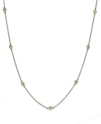 Inch by inch of luminous sparkle. B. Brilliant's delicate necklace features nine round-cut cubic zirconia stations (9/10 ct. t.w.) set in 18k gold over sterling silver. Approximate length: 24 inches. Inch by inch of luminous sparkle. B. Brilliant's delicate necklace features nine round-cut cubic zirconia stations (9/10 ct. t.w.) set in 18k gold over sterling silver. Approximate length: 24 inches.