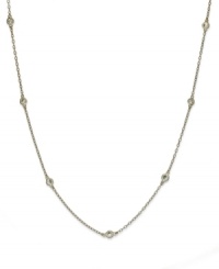 Inch by inch of luminous sparkle. B. Brilliant's delicate necklace features nine round-cut cubic zirconia stations (9/10 ct. t.w.) set in 18k gold over sterling silver. Approximate length: 24 inches.