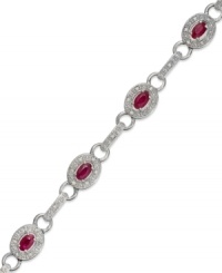 A beautiful combination. Rubies (2-1/2 ct. t.w.) and single-cut diamonds (1/4 ct. t.w.) come together in stunning fashion in this oval link bracelet. Set in sterling silver. Approximate length: 7 inches. A beautiful combination. Rubies (2-1/2 ct. t.w.) and single-cut diamonds (1/4 ct. t.w.) come together in stunning fashion in this oval link bracelet. Set in sterling silver. Approximate length: 7 inches.