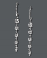 Stun them all with sparkle. EFFY Collection's glamorous five-stone drop earrings feature large and small round-cut diamonds (1 ct. t.w.) in 14k white gold. Approximate drop: 1-5/8 inches. Stun them all with sparkle. EFFY Collection's glamorous five-stone drop earrings feature large and small round-cut diamonds (1 ct. t.w.) in 14k white gold. Approximate drop: 1-5/8 inches.