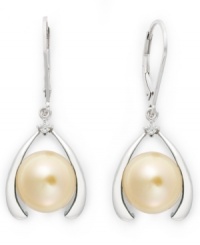 Good luck and a touch of polish. These sophisticated horseshoe-shaped earrings feature a cultured golden South Sea pearl (10-12 mm) and sparkling diamond accents. Earrings secure with a sterling silver lever backing. Approximate drop: 1 inch. Good luck and a touch of polish. These sophisticated horseshoe-shaped earrings feature a cultured golden South Sea pearl (10-12 mm) and sparkling diamond accents. Earrings secure with a sterling silver lever backing. Approximate drop: 1 inch.