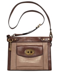 Give your look a vintage vibe with this sankeskin-embossed leather crossbody from Fossil. Practical and poised to handle all your daily essentials, it's the perfect desk-to-dinner design. Give your look a vintage vibe with this sankeskin-embossed leather crossbody from Fossil. Practical and poised to handle all your daily essentials, it's the perfect desk-to-dinner design.