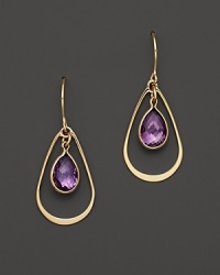 Bezeled amethyst teardrops, framed in 14K yellow gold. Bezeled amethyst teardrops, framed in 14K yellow gold.