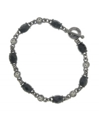 Brand new or one of your grandmother's cherished pieces? Only you'll know with this elegant bracelet by 2028. Faceted jet stones and round-cut crystals alternate for a modern take on old-fashioned sophistication. Set in hematite-plated mixed metal. Approximate diameter: 2-1/2 inches. Brand new or one of your grandmother's cherished pieces? Only you'll know with this elegant bracelet by 2028. Faceted jet stones and round-cut crystals alternate for a modern take on old-fashioned sophistication. Set in hematite-plated mixed metal. Approximate diameter: 2-1/2 inches.