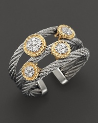 From the Classique collection, a ring with yellow gold and diamond stations on stainless steel cable. Designed by Charriol. From the Classique collection, a ring with yellow gold and diamond stations on stainless steel cable. Designed by Charriol.