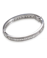 Let your inner-diva shine with this sparkling bangle by Carolee. Bracelet features silvertone mixed metal with diamond and circular-shaped glass crystals. Approximate diameter: 3-1/2 inches. Let your inner-diva shine with this sparkling bangle by Carolee. Bracelet features silvertone mixed metal with diamond and circular-shaped glass crystals. Approximate diameter: 3-1/2 inches.