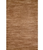 Variegated coloration in subtle striping gives way to modern texture and simple elegance in the Corsica area rug from Liora Manne. Hand-woven in India of pure wool fibers, the Madrid area rug is a comforting, stylish addition to any decor.