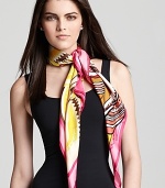 Elegant and exotic, Echo's tiger print scarf infuses your wardrobe with a wild touch.