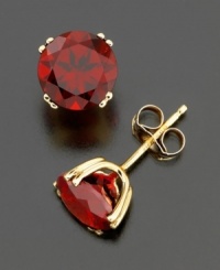 Deep-red, gorgeous garnets are a colorful alternative to classic stud earrings. These round-cut stones (4 ct. t.w.) add glamour to any look. Set in 14k gold.