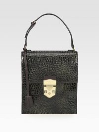Beautiful glossy textured leather in a chic narrow frame.Adjustable top handle, 4½-6½ dropPush-lock flap closureOne inside open pocketLeather lining7¾W X 9H X 2DMade in Italy Beautiful glossy textured leather in a chic narrow frame.Adjustable top handle, 4½-6½ dropPush-lock flap closureOne inside open pocketLeather lining7¾W X 9H X 2DMade in Italy