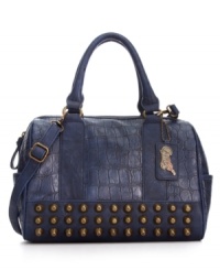 Add some allure to your everyday accessorizing with this rocker-chic inspired silhouette from Carol by Carolos Santana. Faux croc-embossed leather plays a ladylike backdrop to the edgy stud accents, for a look that works day or night. Add some allure to your everyday accessorizing with this rocker-chic inspired silhouette from Carol by Carolos Santana. Faux croc-embossed leather plays a ladylike backdrop to the edgy stud accents, for a look that works day or night.