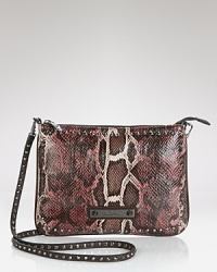 Slung over your shoulder or across your chest, Sam Edelman's signature snake pouch exudes sleek style. Slung over your shoulder or across your chest, Sam Edelman's signature snake pouch exudes sleek style.