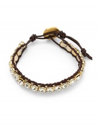 THE LOOKClassic collectionSwarovski crystal accents18k goldplated settingBraided leatherToggle closureTHE MEASUREMENTAccent width, about .37Length, about 8.5ORIGINMade in USA THE LOOKClassic collectionSwarovski crystal accents18k goldplated settingBraided leatherToggle closureTHE MEASUREMENTAccent width, about .37Length, about 8.5ORIGINMade in USA