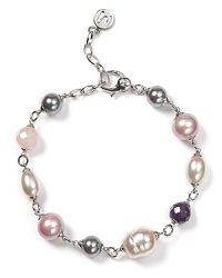 Luminous and versatile. Pearls are always a classic, and this multicolored bracelet from Majorica is a striking way to wear them. Luminous and versatile. Pearls are always a classic, and this multicolored bracelet from Majorica is a striking way to wear them.