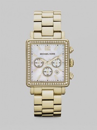 Show your true sparkle in this radiant, technical timepiece with a crystal bezel. Quartz movementWater resistant to 5 ATMRectangular goldtone stainless steel case, 35mm (1.3) X 32mm (1.2)Crystal bezelMother-of-pearl chronograph dialNumeric and bar hour markersDate display between 4 and 5 o'clockSecond hand Goldtone stainless steel link braceletImported Show your true sparkle in this radiant, technical timepiece with a crystal bezel. Quartz movementWater resistant to 5 ATMRectangular goldtone stainless steel case, 35mm (1.3) X 32mm (1.2)Crystal bezelMother-of-pearl chronograph dialNumeric and bar hour markersDate display between 4 and 5 o'clockSecond hand Goldtone stainless steel link braceletImported