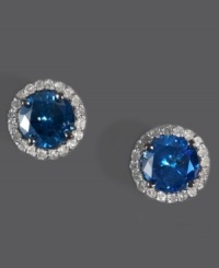 Add a touch of royalty to your look. EFFY Collection's standout stud earrings combine round-cut blue diamond (1-5/8 ct. t.w) with halos of sparkling round-cut white diamonds (1/6 ct. t.w.). Set in 14k white gold. Approximate diameter: 5/16 inch. Add a touch of royalty to your look. EFFY Collection's standout stud earrings combine round-cut blue diamond (1-5/8 ct. t.w) with halos of sparkling round-cut white diamonds (1/6 ct. t.w.). Set in 14k white gold. Approximate diameter: 5/16 inch.