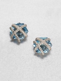 From the Cable Wrap Collection. An pretty, hexagon-shaped blue topaz stone wrapped in sterling silver cables and dazzling diamonds. Blue topazDiamonds, .07 tcwSterling silverSize, about .39Post backImported From the Cable Wrap Collection. An pretty, hexagon-shaped blue topaz stone wrapped in sterling silver cables and dazzling diamonds. Blue topazDiamonds, .07 tcwSterling silverSize, about .39Post backImported