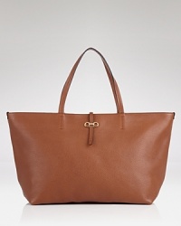 Expertly fusing functional design with a luxe feel, Salvatore Ferragamo's roomy leather tote makes the perfect polished-practical statement. Expertly fusing functional design with a luxe feel, Salvatore Ferragamo's roomy leather tote makes the perfect polished-practical statement.