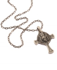 A cross with a little extra flair. This pendant by the Simmons Jewelry Co. features a stainless steel cross with a raised wing and skull design. Approximate length: 22 inches. Approximate drop: 2-1/4 inches. A cross with a little extra flair. This pendant by the Simmons Jewelry Co. features a stainless steel cross with a raised wing and skull design. Approximate length: 22 inches. Approximate drop: 2-1/4 inches.