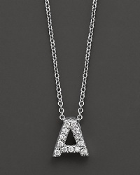 From the Tiny Treasures collection, a diamond A necklace. With signature ruby accent. Designed by Roberto Coin. From the Tiny Treasures collection, a diamond A necklace. With signature ruby accent. Designed by Roberto Coin.