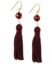 Totally on trend! Tassels are the thing this season, and these crimson-colored tassel and carnelian bead earrings (8-3/4 ct. t.w.) complete the look. Set in 18k gold over sterling silver. Approximate drop: 2-1/4 inches. Totally on trend! Tassels are the thing this season, and these crimson-colored tassel and carnelian bead earrings (8-3/4 ct. t.w.) complete the look. Set in 18k gold over sterling silver. Approximate drop: 2-1/4 inches.