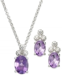 Introducing rich, jewel tone hues! Victoria Townsend's beautiful drop earrings and matching pendant feature oval-cut amethyst (2-9/10 ct. t.w.) topped with a trio of sparkling diamond accents. Crafted in sterling silver. Approximate length: 18 inches. Approximate drop (pendant): 1/2 inch. Approximate drop (earrings): 1/2 inch.