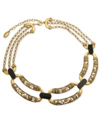 Bold and beautiful. T Tahari's statement necklace, part of its Deco Lace Collection, is crafted from gold-tone mixed metal with black stones and glass crystal accents adding a lustrous effect. Approximate length: 17 inches + 3-inch extender. Bold and beautiful. T Tahari's statement necklace, part of its Deco Lace Collection, is crafted from gold-tone mixed metal with black stones and glass crystal accents adding a lustrous effect. Approximate length: 17 inches + 3-inch extender.