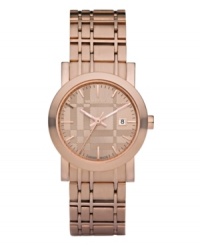 This Burberry watch features a check-inspired rose gold ion-plated stainless steel bracelet and round case. Rose gold tone dial with check pattern features applied stick indices, minute track, date window at three o'clock, three hands and logo. Swiss made. Quartz movement. Water resistant to 50 meters. Two-year limited warranty. This Burberry watch features a check-inspired rose gold ion-plated stainless steel bracelet and round case. Rose gold tone dial with check pattern features applied stick indices, minute track, date window at three o'clock, three hands and logo. Swiss made. Quartz movement. Water resistant to 50 meters. Two-year limited warranty.