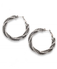 Definitely dazzling! Glittering glass accents and crystals dress up these gorgeous twisted hoop earrings from Alfani. Crafted in hematite tone mixed metal, they'll add a glamorous element to even the most casual outfit. Approximate diameter: 2 inches. Definitely dazzling! Glittering glass accents and crystals dress up these gorgeous twisted hoop earrings from Alfani. Crafted in hematite tone mixed metal, they'll add a glamorous element to even the most casual outfit. Approximate diameter: 2 inches.