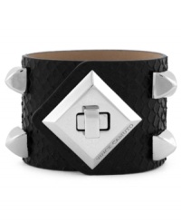 Rough and ready style from Vince Camuto. This chic cuff bracelet features silver tone stud and turnlock details. Crafted with black snake-embossed leather. Approximate length: 8-1/2 inches. Approximate diameter: 2-1/2 inches. Rough and ready style from Vince Camuto. This chic cuff bracelet features silver tone stud and turnlock details. Crafted with black snake-embossed leather. Approximate length: 8-1/2 inches. Approximate diameter: 2-1/2 inches.