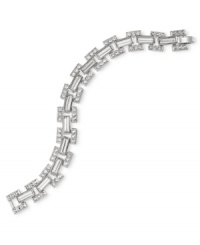 The shining example. Light up the night with this link flex bracelet from Carolee. Crafted from silver-tone mixed metal, it's adorned with glass stones and crystals for a lustrous touch. Approximate length: 7-1/2 inches. The shining example. Light up the night with this link flex bracelet from Carolee. Crafted from silver-tone mixed metal, it's adorned with glass stones and crystals for a lustrous touch. Approximate length: 7-1/2 inches.