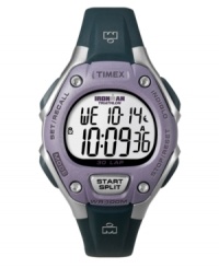 Classic Ironman styling with functions needed by athletes at every level. Watch by Timex crafted of black resin strap and round case. Purple bezel with four silver tone lugs. Positive display digital dial features INDIGLO night-light, chronograph, lap counter, countdown timer and 15 date reminders. Quartz movement. Water resistant to 100 meters. One-year limited warranty. Classic Ironman styling with functions needed by athletes at every level. Watch by Timex crafted of black resin strap and round case. Purple bezel with four silver tone lugs. Positive display digital dial features INDIGLO night-light, chronograph, lap counter, countdown timer and 15 date reminders. Quartz movement. Water resistant to 100 meters. One-year limited warranty.