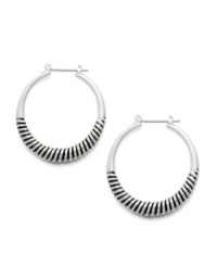 Stylish and savvy. These hoop earrings by Alfani boast an extra hint of texture in a silver tone and hematite tone mixed metal setting. Approximate diameter: 1-5/16 inches. Stylish and savvy. These hoop earrings by Alfani boast an extra hint of texture in a silver tone and hematite tone mixed metal setting. Approximate diameter: 1-5/16 inches.