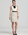 Trina Turk's ladylike twofer dress shimmers in a sparkling tweed. A bow-detailed neckline lends a feminine finish.