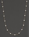 Beaded 14 Kt. white gold necklace with fresh water pearl stations.