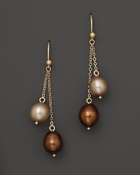 Richly hued champagne and chocolate pearls dangle from 14K. yellow gold chains. Richly hued champagne and chocolate pearls dangle from 14K. yellow gold chains.