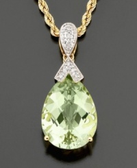 A jewel drop to enchant. This faceted green quartz (9 ct. t.w.) pendant is topped with sparkling bow-shaped diamond accents and finished in 14K gold. Approximate length: 18 inches. Approximate drop: 1-1/4 inches. A jewel drop to enchant. This faceted green quartz (9 ct. t.w.) pendant is topped with sparkling bow-shaped diamond accents and finished in 14K gold. Approximate length: 18 inches. Approximate drop: 1-1/4 inches.