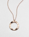 Delightfully simple, a wavy open circle pendant in sterling silver and 18k gold has a warm glowing finish of 18k rose goldplating, as does its delicate chain.18k gold and sterling silver with 18k rose goldplatingChain length, about 16-18 (adjustable)Pendant diameter, about 1Lobster claspImported