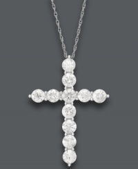 Symbolic sparkle makes the perfect gift. This stunning cross pendant offers a luminous look with its round-cut diamond decor (2 ct. t.w.). Crafted in 14k white gold. Approximate length: 18 inches. Approximate drop: 1-1/10 inches. Symbolic sparkle makes the perfect gift. This stunning cross pendant offers a luminous look with its round-cut diamond decor (2 ct. t.w.). Crafted in 14k white gold. Approximate length: 18 inches. Approximate drop: 1-1/10 inches.