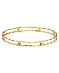 Embrace the season's eclectic approach to accessorizing with this layered gold-plated bangle from Melinda Maria, adorned with striking turquoise-colored stones. Its delicate design will make a perfect addition to your jewel box. Embrace the season's eclectic approach to accessorizing with this layered gold-plated bangle from Melinda Maria, adorned with striking turquoise-colored stones. Its delicate design will make a perfect addition to your jewel box.