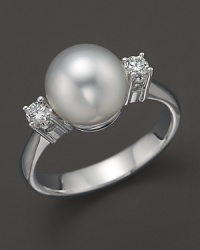 A timeless classic, this Tara Pearls ring combines 18K white gold with a stunning South Sea pearl detailed with two sparkling diamonds. A timeless classic, this Tara Pearls ring combines 18K white gold with a stunning South Sea pearl detailed with two sparkling diamonds.