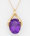 A beautiful and elegant 14k gold wishbone setting suspends an oval-cut amethyst (9 ct. t.w.) pendant. Chain measures 18 inches.