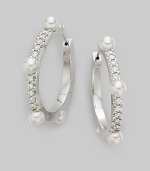 Classic 18K white gold hoops with diamonds and cultured pearl accents.3.5mm cultured pearl Diamond, 0.3 tcw 18K white gold Pierced Imported 