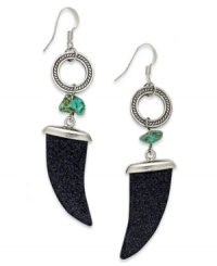 Biting style. These blue-gold tone stone tooth earrings by Ali Khan features semi-precious turquoise chips. Crafted in silver tone mixed metal. Approximate drop: 2-1/8 inches. Biting style. These blue-gold tone stone tooth earrings by Ali Khan features semi-precious turquoise chips. Crafted in silver tone mixed metal. Approximate drop: 2-1/8 inches.
