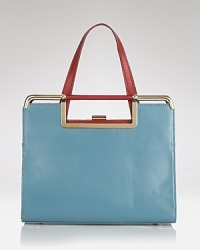 Z Spoke Zac Posen mines the fashion archives for it's latest must-have handbag. The frame shape feels classic, while the glossy leather is so right now. Z Spoke Zac Posen mines the fashion archives for it's latest must-have handbag. The frame shape feels classic, while the glossy leather is so right now.